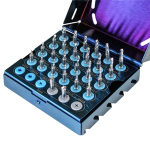 An open blue square box with 5 rows of 6 drill storage slots each. The top row starts with 3.0 to 3.9 millimeter diameter drills in lengths from 6 to 15 millimeters. The bottom row ends with 1.5 to 2.2 millimeter diameter drills in lengths from 6 to 15 millimeters.